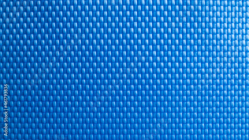Nylon blue texture. Dark polyester fiber material for sport cloth or abstract weave background. Carbon pattern for wallpaper, graphic design.