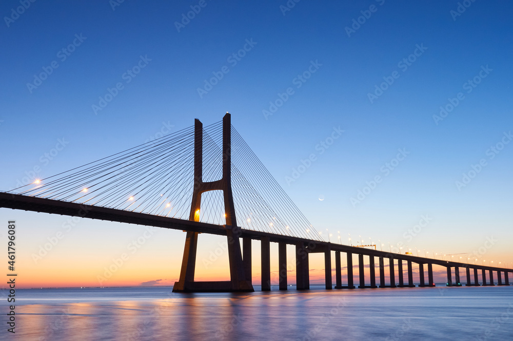 Fototapeta premium Long exposure shot of Vasco da Gama bridge in Lisbon before sunrise