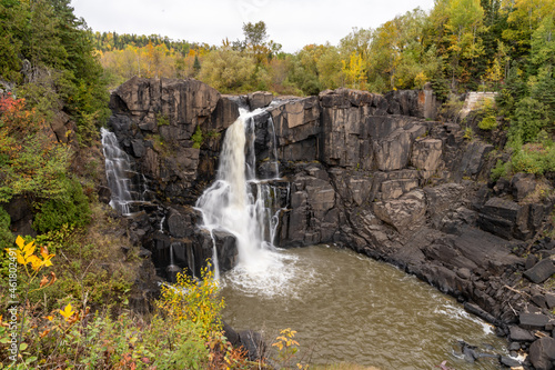 Fototapeta Naklejka Na Ścianę i Meble -  High Falls waterfall in Grand Portage State Park in the fall autumn season
