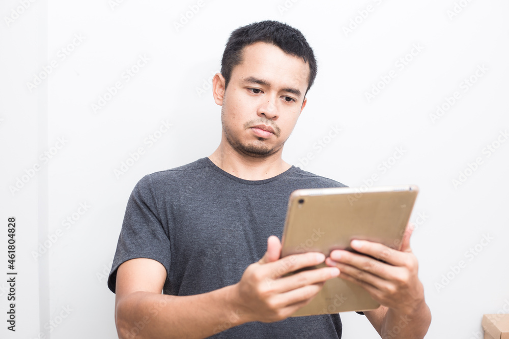Business asian man use ipad tablet computer standing Business asian man use ipad tablet computer standing