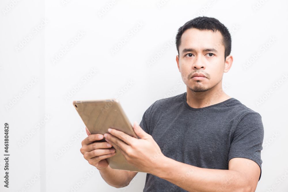 Business asian man use ipad tablet computer standing Business asian man use ipad tablet computer standing