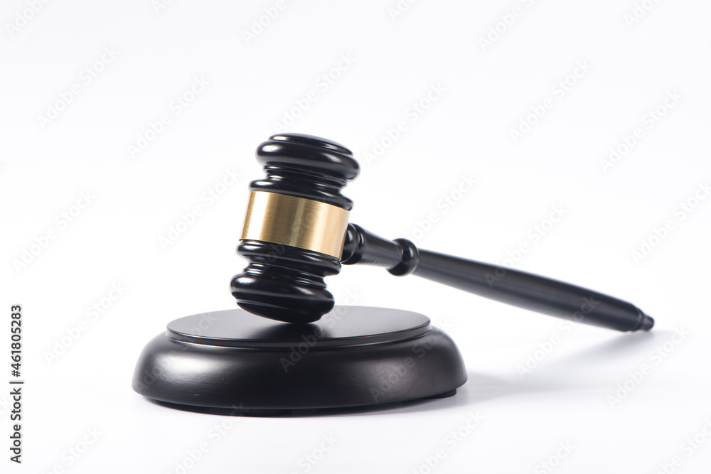 a wooden judge gavel isolated on white background a wooden judge gavel isolated on white background