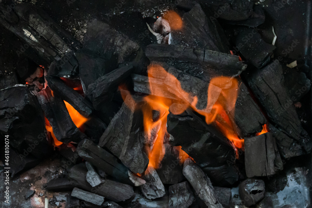 Flames in coals during barbecue