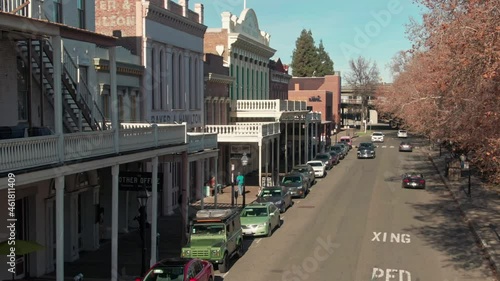 Aerial: Old Sacramento historic district with gold rush rer buildings. California, USA photo