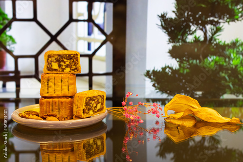 Moon cake with pretty background  a traditional food  cuisine  or snack for Chinese or Asian  Mid-Autumn festival 