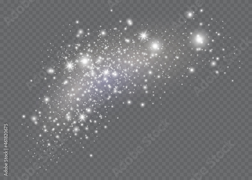 The dust sparks and golden stars shine with special light. Vector sparkles on a transparent background. Christmas light effect. Sparkling magical dust particles.