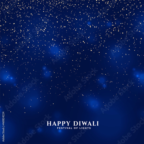 happy diwali blue background with falling fireworks sparkles