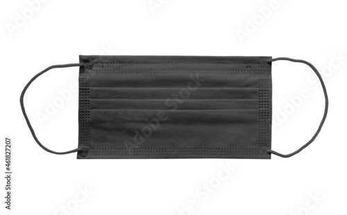 Black medical mask on a white background close-up.