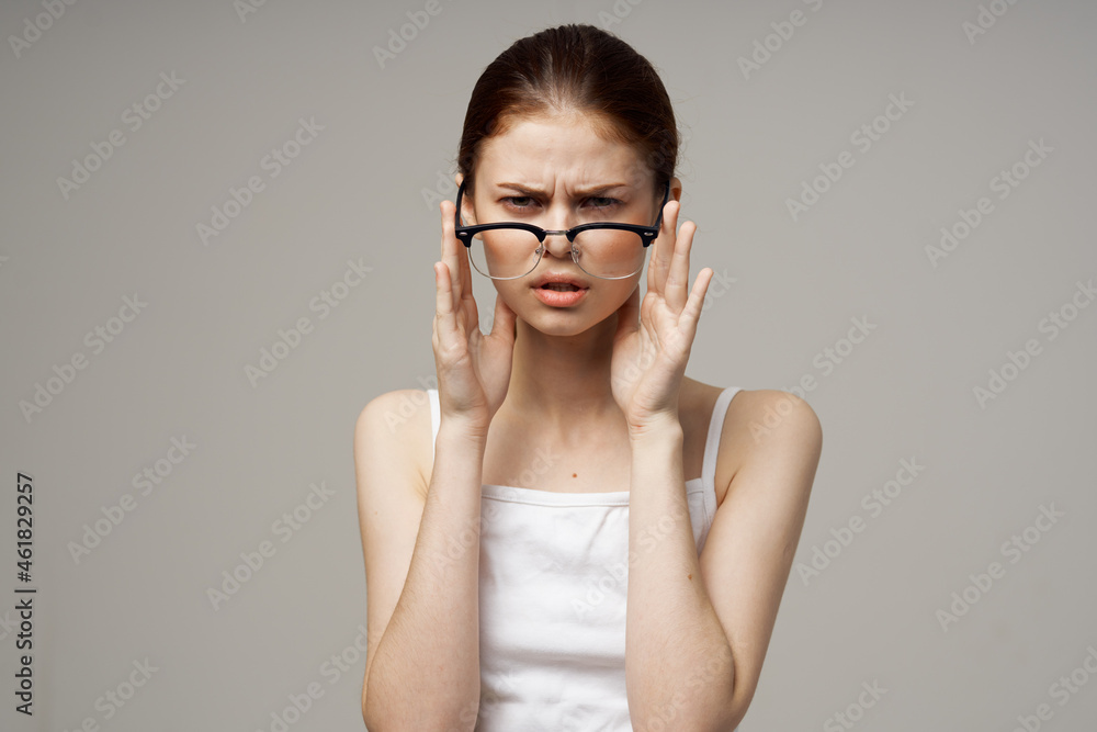 disgruntled woman vision problems myopia light background disgruntled woman vision problems myopia light background