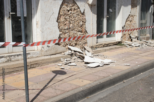 Heraklion, Crete, Greece, September 28 2021: A day after the catastrophic earthquake 5,8 magnitude at the town of Arkalochori. Damaged buildings, pavements full of wall fragments and debris.