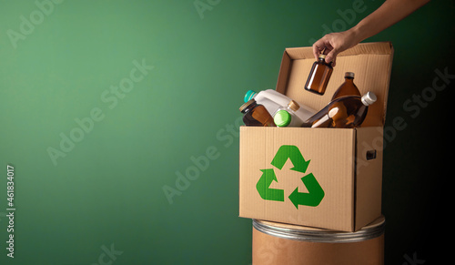 Climate and Environmentally Conservation Concept. Recycling Corrugated Box with Full of Plastic and Glass Bottle. Zero Waste, Reduce Plastic. Environment, Ecology Care and Renewable