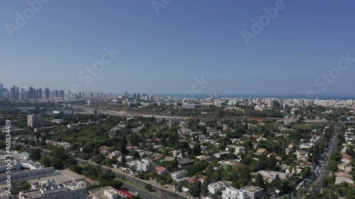 Tel Aviv northern Tel Baruch skyline, with traffic and low build houses.
 photo