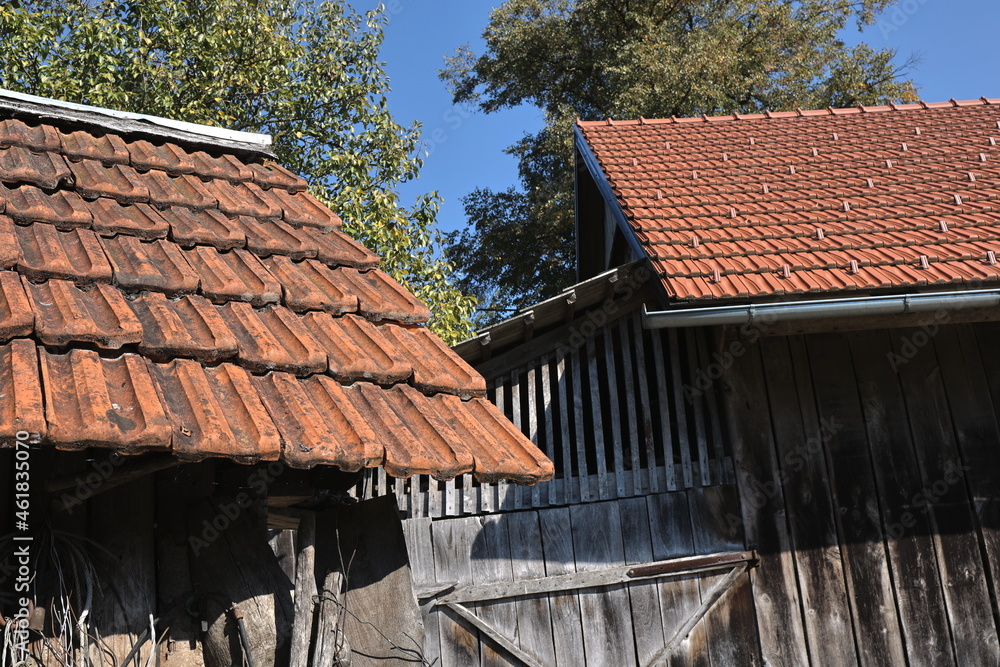 Shed roofs with old and new tiles Shed roofs with old and new tiles