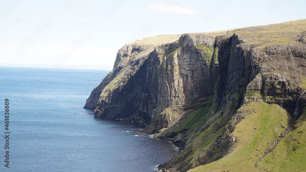 Rugged sea and cliff landscapes on Suðuroy Island in the Faroe Islands of Denmark.