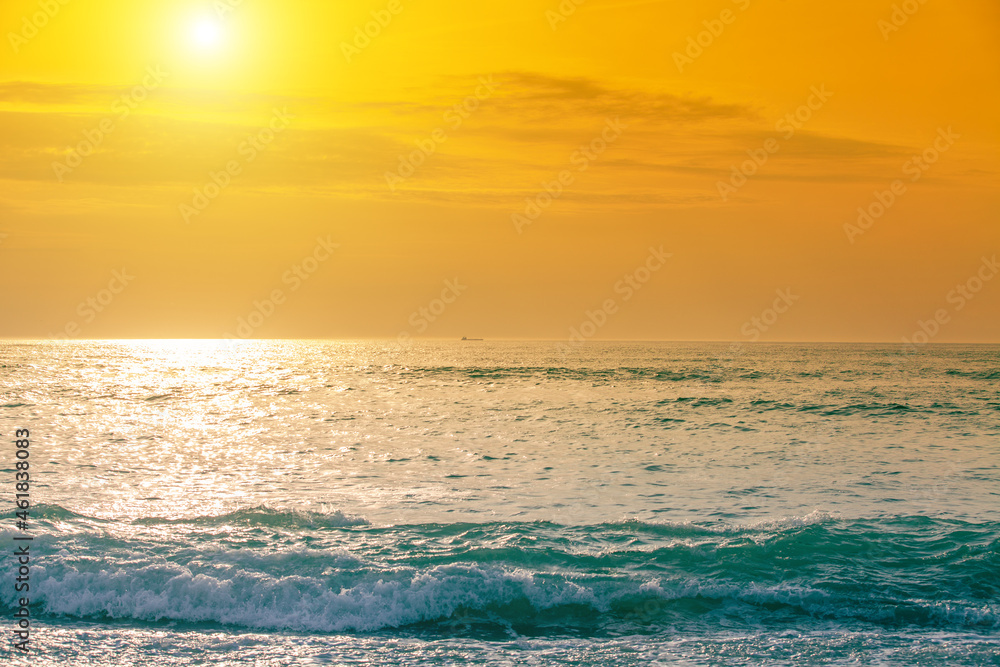 Seascape in the evening with the golden sky. Nature landscape