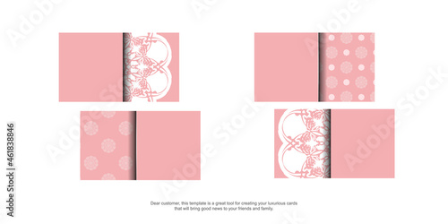 Business card template in pink with vintage white ornaments for your business.