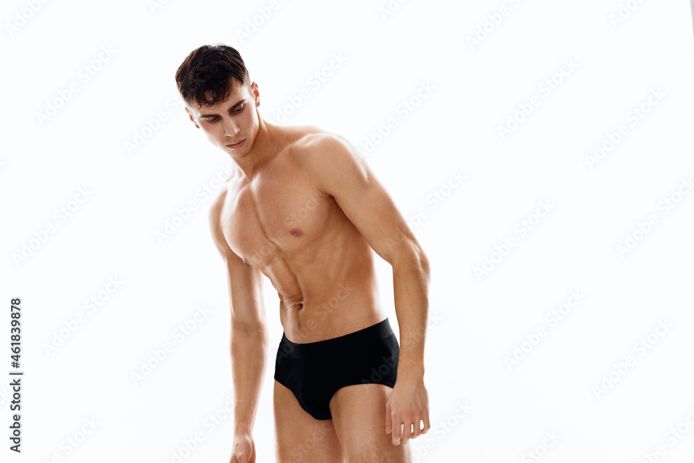 nude man in black panties brunette light background cropped view nude man in black panties brunette light background cropped view