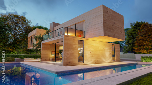 Big contemporary villa in light wood with pool and garden in the evening © FrankBoston