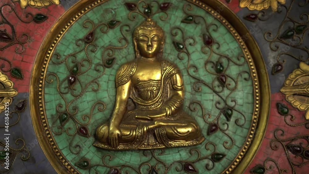 Golden Budha idol at rustic background Golden Budha idol at rustic background