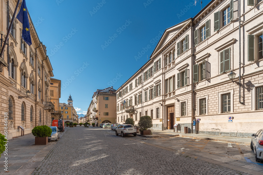Cuneo, Piedmont, Italy - October 6, 2021: beginning of Via Roma (Rome Street), on the right building with Auditorum San Giovanni and offices cominale
