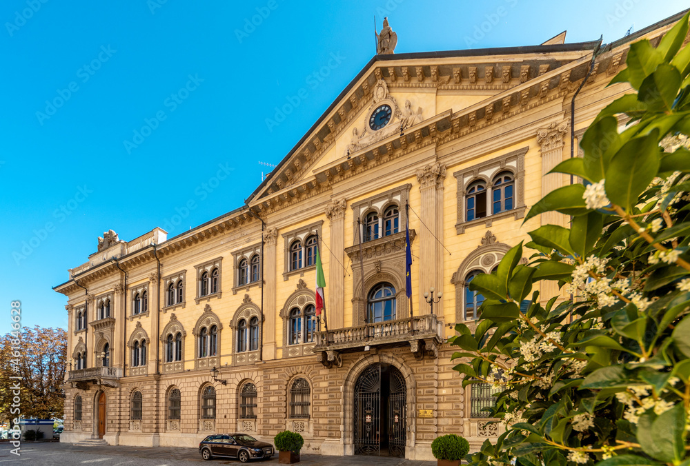 Cuneo, Piedmont, Italy - October 6, 2021: The building Prefecture Cuneo (designed by Pietro Carrera 1882) in street Rome, majestic neoclassical building at the beginning of via Roma