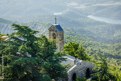 Bell tower of the Notre-Dame-de-Victoire chapel on the Montagne Sainte-Victoire mountain in Provence, France photo