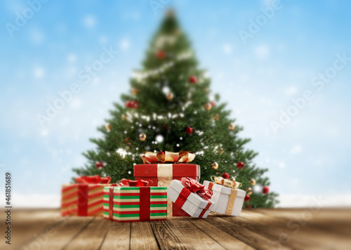 partially blurred green fir and festive christmas gifts on wooden floor with snow in the background 3d-illustration background