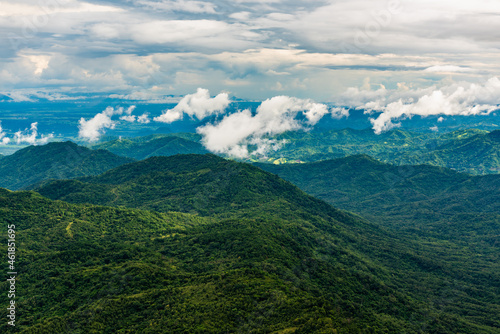 Clouds  mist  cover the mountain peaks  tropical rainforests  Thailand