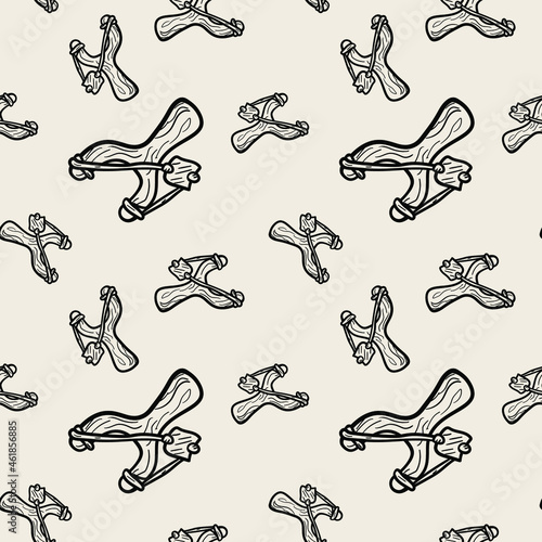 Drawn slingshots. Vector two-tone seamless pattern
