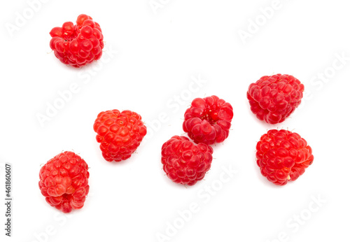 Red raspberries on a white background.