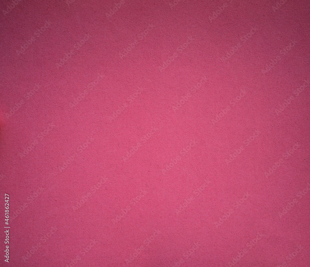 The texture of paper cardboard is pink. Pink background for greeting text. The texture of paper cardboard is pink. Pink background for greeting text.