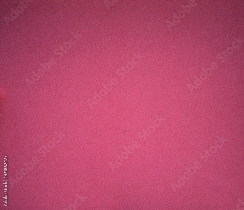 The texture of paper cardboard is pink. Pink background for greeting text.