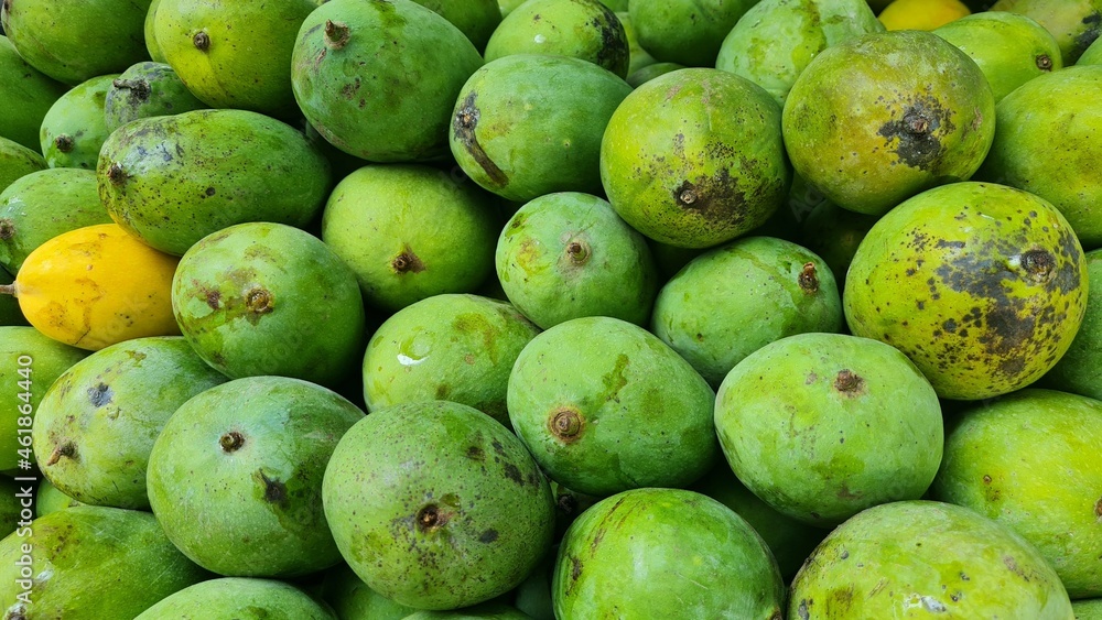 pile of mangoes in the market