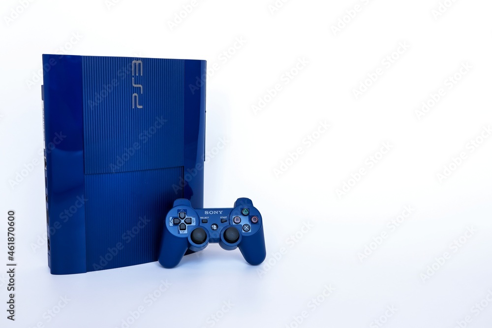 Bangkok, Thailand - February 28, 2021 : Azurite Blue model of Playstation 3  home video game console with wireless PS3 DualShock controller. Photos |  Adobe Stock