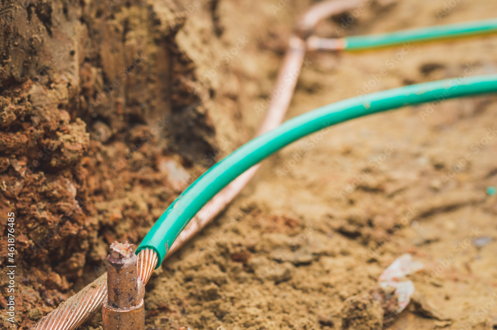 Welding copper ground wire on ground rod.Welding copper ground wire