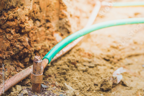 Welding copper ground wire on ground rod.Welding copper ground wire.Connect copper grounding lightning protection system. With the melting