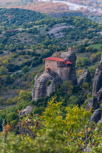Agios Nikolaos monastery, an unesco world heritage site, located on a unique rock formation above the village of Kalambaka during fall season. 