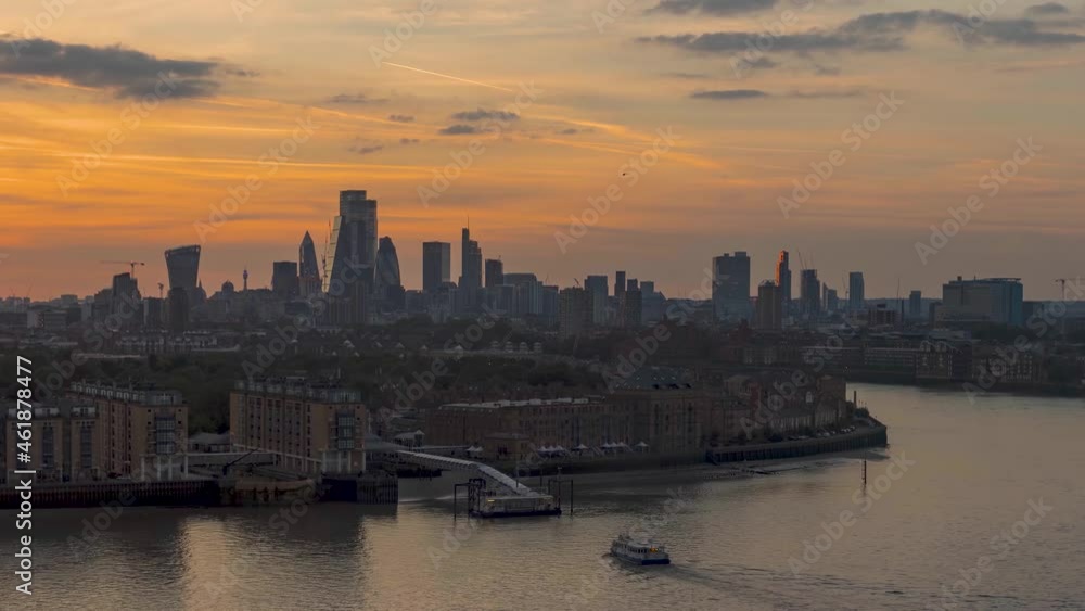 Sunset to night time lapse view of the skyline of the financial district City of London, United Kingdom Sunset to night time lapse view of the skyline of the financial district City of London, United Kingdom