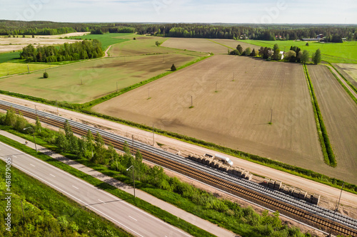 Aerial panoramic view of pathway, road and railway in place Myllykoski in Kouvola, Finland. © Elena Noeva