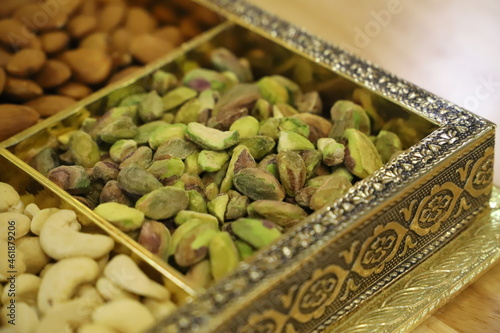 Luxurious Pistachios in Box: Pristine, Organic Nuts Elegantly Displayed for Premium Gifting and Healthy Snacking - High-Quality Image