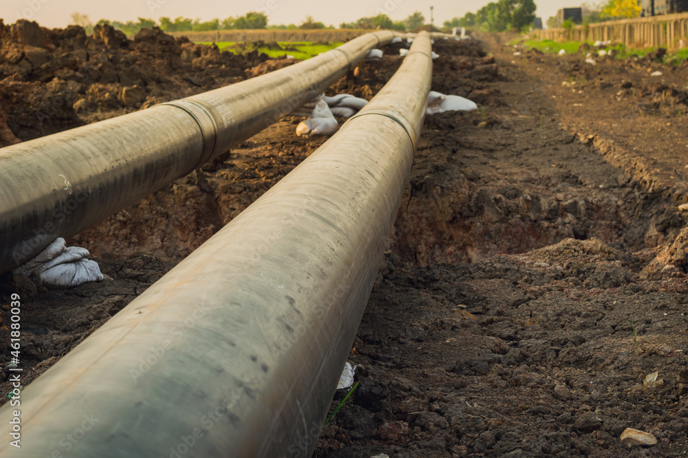 Construction of a new energy pipeline of Oil or Gas pipeline,Pipes at a construction site to be used in a new energy pipeline . Construction of a new energy pipeline of Oil or Gas pipeline,Pipes at a construction site to be used in a new energy pipeline .