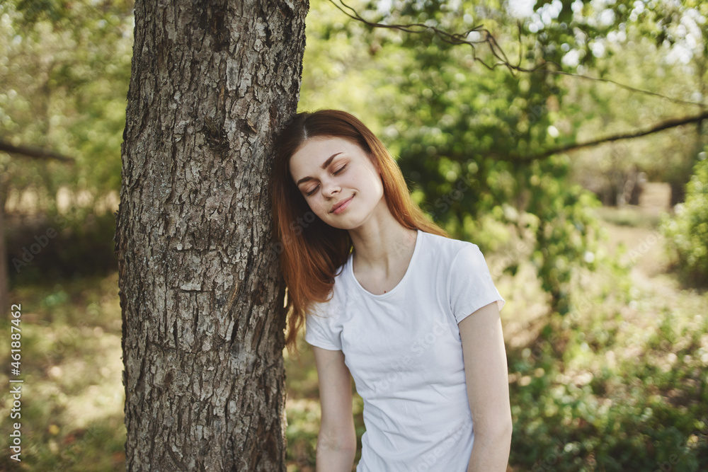 woman near the tree nature Lifestyle summer woman near the tree nature Lifestyle summer