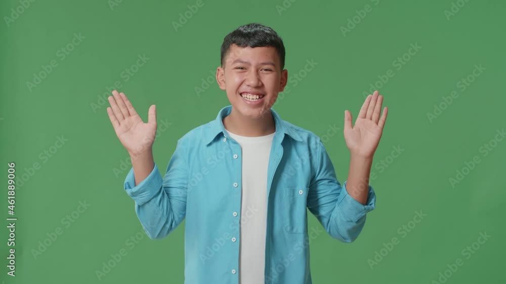 The Inspired Young Asian Boy Smile And Pointing To The Side While Standing In The Green Screen Studio
The Inspired Young Asian Boy Smile And Pointing To The Side While Standing In The Green Screen Studio