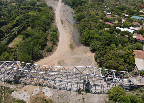 Aerial view over a dried river because of climate change effect photo