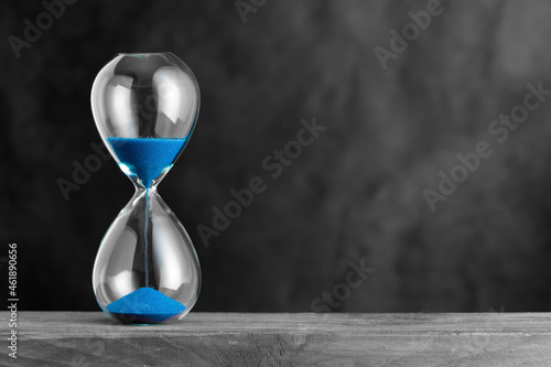 hourglass with blue sand