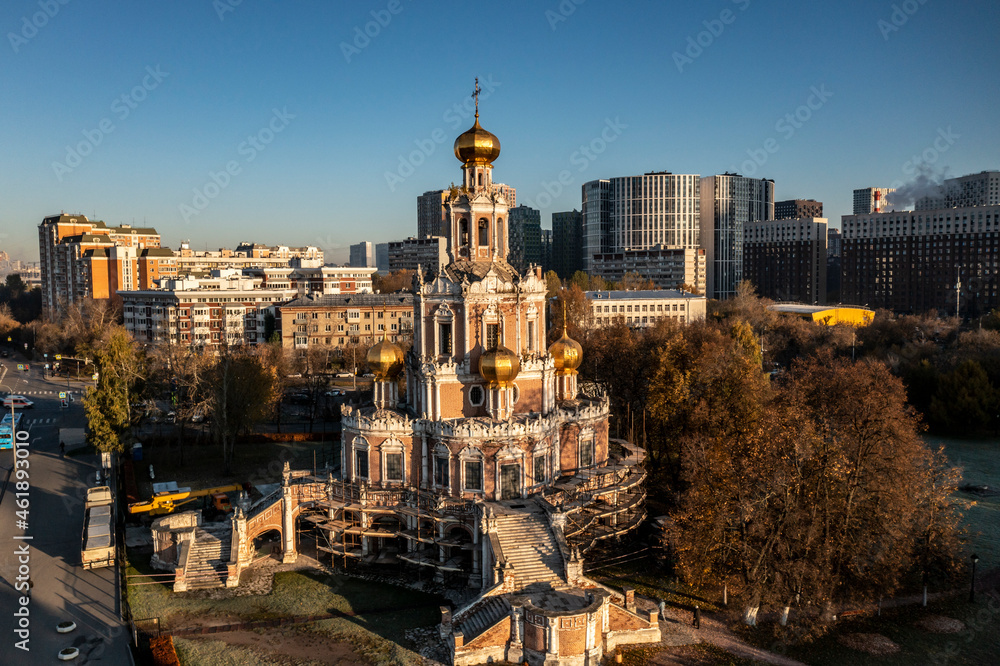 a panoramic view of a beautiful church in the early morning from a drone