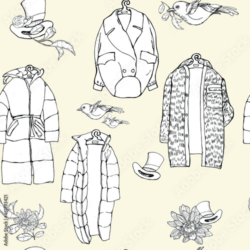 vector illustration seamless pattern,silhouette of outerwear on hangers,for  wallpaper or fabric