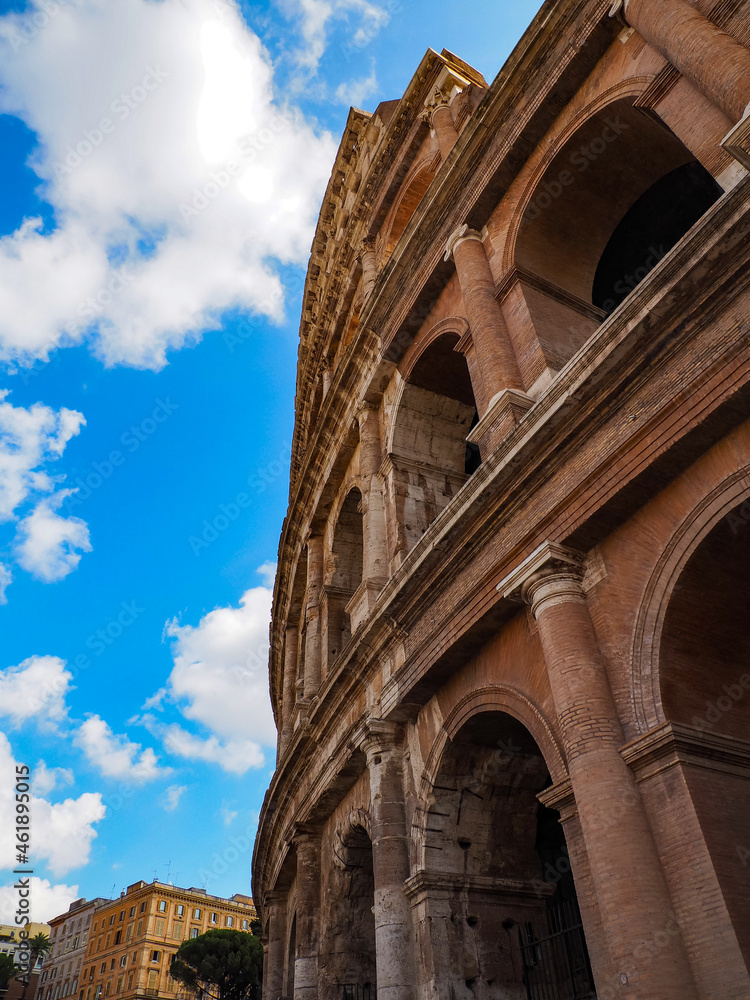 Roman Colosseum against a Blue Cloudy Sky