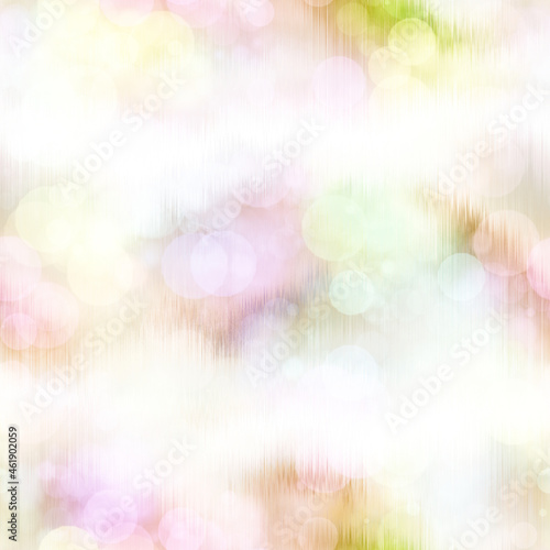 Seamless pale pastel tie dye bokeh texture. Soft tone on tone summer repeat background with washed out sun bleached ink dyed effect. 