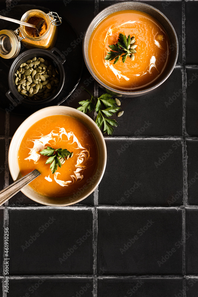 pumpkin soup on a black background pumpkin soup on a black background